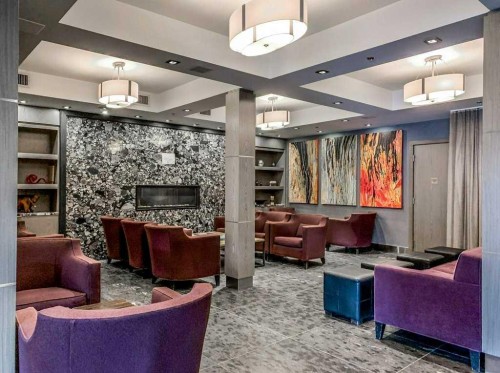 322-901 Mountain Street, Canmore, AB - Indoor Photo Showing Other Room With Fireplace