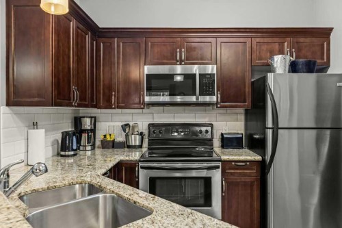 322-901 Mountain Street, Canmore, AB - Indoor Photo Showing Kitchen With Double Sink