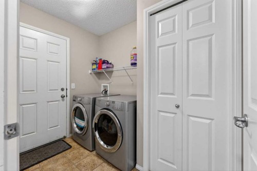 106 Saddlecrest Crescent Ne, Calgary, AB - Indoor Photo Showing Laundry Room