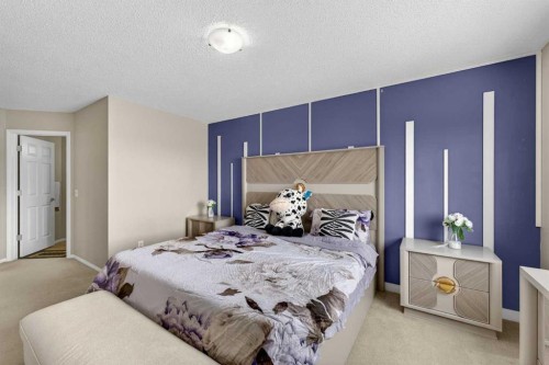 106 Saddlecrest Crescent Ne, Calgary, AB - Indoor Photo Showing Bedroom
