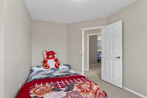 106 Saddlecrest Crescent Ne, Calgary, AB - Indoor Photo Showing Bedroom