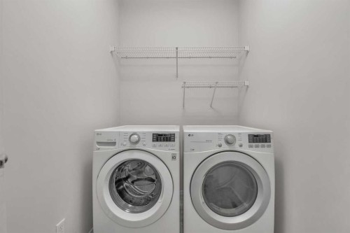 368 New Brighton Place Se, Calgary, AB - Indoor Photo Showing Laundry Room