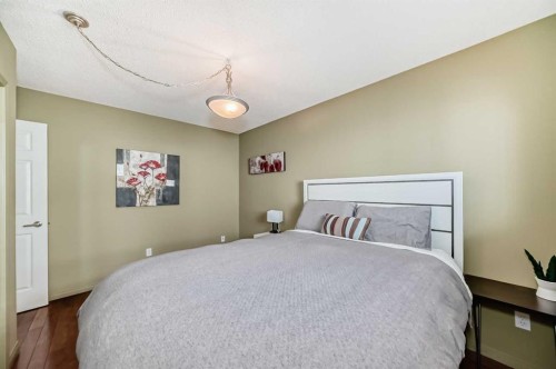 52 Hidden Vale Crescent Nw, Calgary, AB - Indoor Photo Showing Bedroom