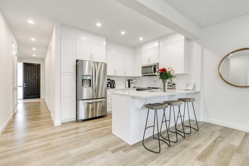 156 Crestridge Common Sw, Calgary, AB - Indoor Photo Showing Kitchen With Upgraded Kitchen