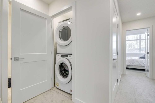 156 Crestridge Common Sw, Calgary, AB - Indoor Photo Showing Laundry Room