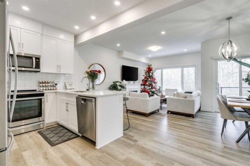 156 Crestridge Common Sw, Calgary, AB - Indoor Photo Showing Kitchen With Upgraded Kitchen