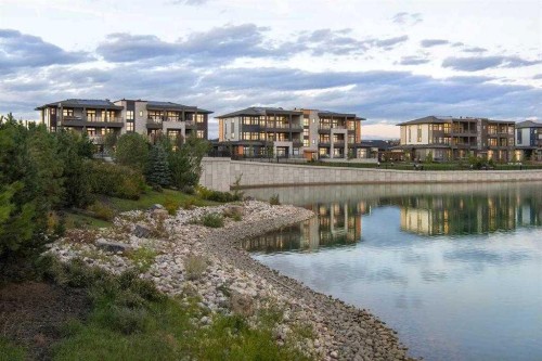 301-140 Marina Cove Se, Calgary, AB - Outdoor With Body Of Water