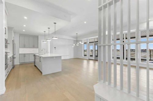 301-140 Marina Cove Se, Calgary, AB - Indoor Photo Showing Kitchen With Upgraded Kitchen