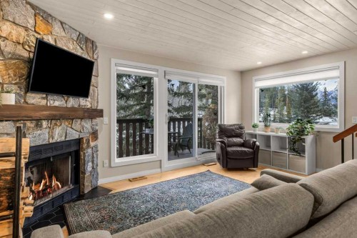 1-1061 Evergreen Circle, Canmore, AB - Indoor Photo Showing Living Room With Fireplace