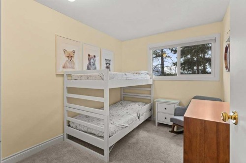 1-1061 Evergreen Circle, Canmore, AB - Indoor Photo Showing Bedroom