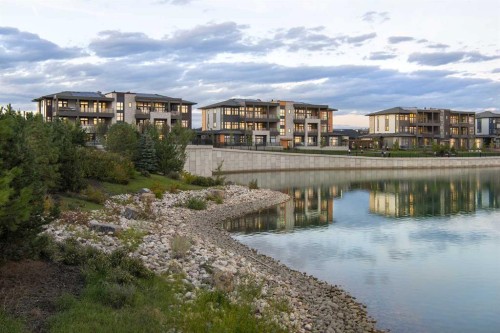 202-140 Marina Cove Se, Calgary, AB - Outdoor With Body Of Water