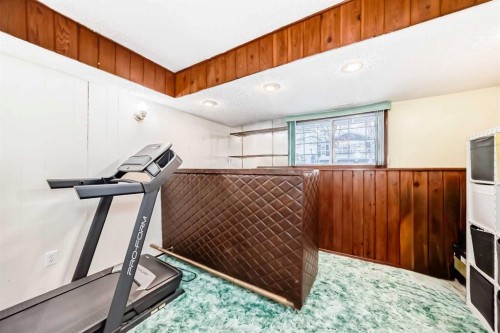 791 Penbrooke Road Se, Calgary, AB - Indoor Photo Showing Gym Room