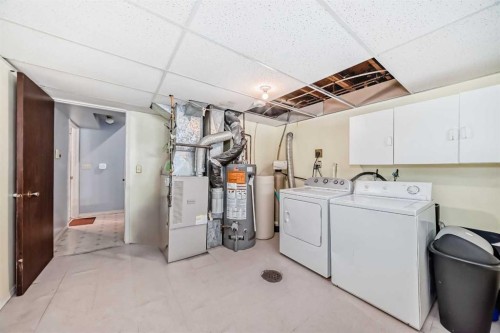 791 Penbrooke Road Se, Calgary, AB - Indoor Photo Showing Laundry Room