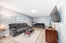 791 Penbrooke Road Se, Calgary, AB  - Indoor Photo Showing Living Room 