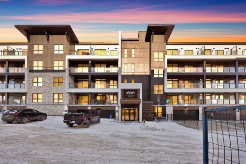 7322-1802 Mahagony Boulevard Se, Calgary, AB - Outdoor With Balcony With Facade