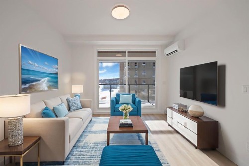 7322-1802 Mahagony Boulevard Se, Calgary, AB - Indoor Photo Showing Living Room