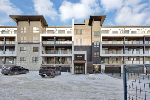 7322-1802 Mahagony Boulevard Se, Calgary, AB - Outdoor With Balcony With Facade