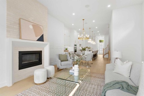 2019 6 Avenue Nw, Calgary, AB - Indoor Photo Showing Living Room With Fireplace