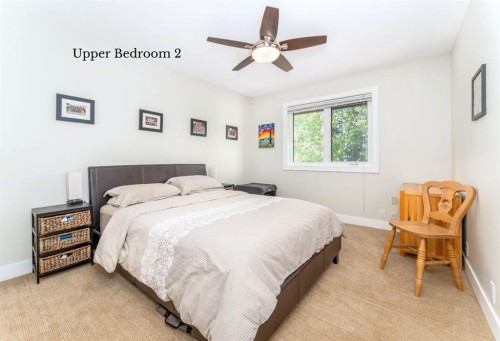 4 Woodside Lane, Canmore, AB - Indoor Photo Showing Bedroom