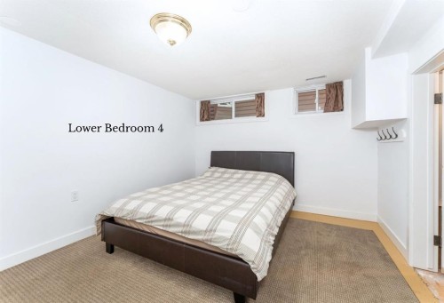 4 Woodside Lane, Canmore, AB - Indoor Photo Showing Bedroom