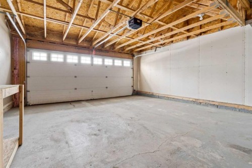 157 Hidden Creek Gardens Nw, Calgary, AB - Indoor Photo Showing Garage