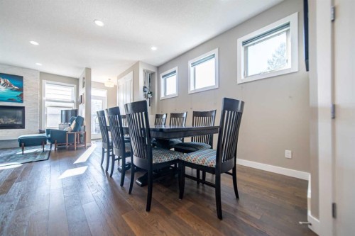 3524 41 Street Sw, Calgary, AB - Indoor Photo Showing Dining Room With Fireplace