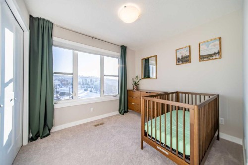713 Crestridge Common Sw, Calgary, AB - Indoor Photo Showing Bedroom