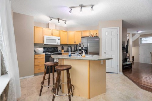 205 Mckenzie Towne Gate Se, Calgary, AB - Indoor Photo Showing Kitchen