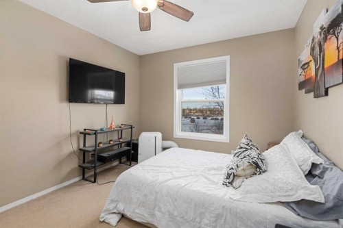 205 Mckenzie Towne Gate Se, Calgary, AB - Indoor Photo Showing Bedroom