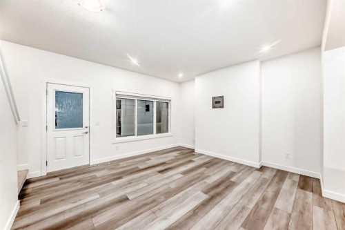 1449 Bayview Point Sw, Airdrie, AB - Indoor Photo Showing Other Room