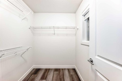 1449 Bayview Point Sw, Airdrie, AB - Indoor With Storage