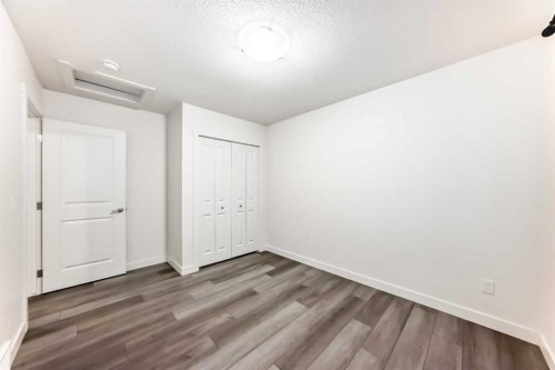 1449 Bayview Point Sw, Airdrie, AB - Indoor Photo Showing Other Room