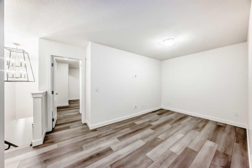 1449 Bayview Point Sw, Airdrie, AB - Indoor Photo Showing Other Room