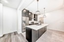 1449 Bayview Point Sw, Airdrie, AB  - Indoor Photo Showing Kitchen With Upgraded Kitchen 