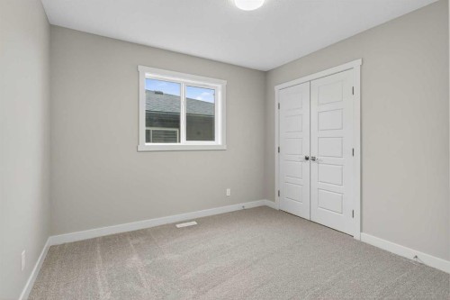 37 Southborough Lane, Cochrane, AB - Indoor Photo Showing Other Room