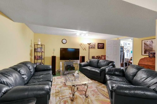 2623 Glencastle Street Sw, Calgary, AB - Indoor With Fireplace