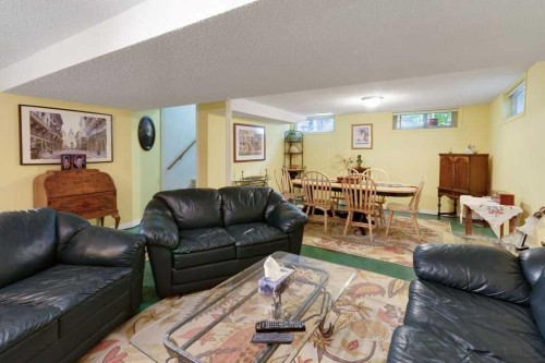 2623 Glencastle Street Sw, Calgary, AB - Indoor Photo Showing Living Room