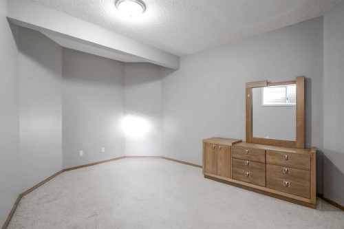 60 Mckenzie Lake Crescent Se, Calgary, AB - Indoor Photo Showing Other Room