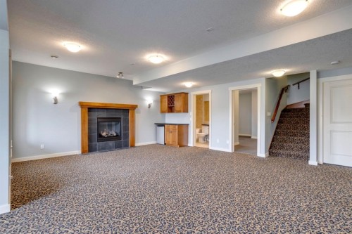 461 Discovery Ridge Boulevard Sw, Calgary, AB - Indoor With Fireplace