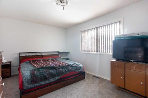 6003 Baroc Road Nw, Calgary, AB - Indoor Photo Showing Bedroom