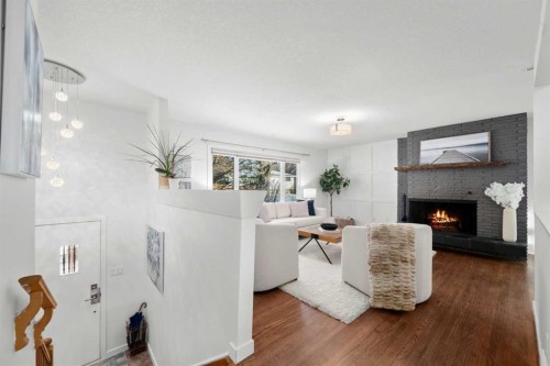 3251 Bearspaw Drive Nw, Calgary, AB - Indoor With Fireplace