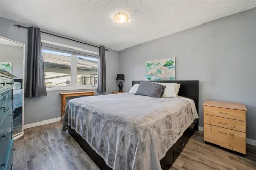 106 Eldorado Road Se, Airdrie, AB - Indoor Photo Showing Bedroom