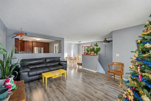 106 Eldorado Road Se, Airdrie, AB - Indoor Photo Showing Living Room