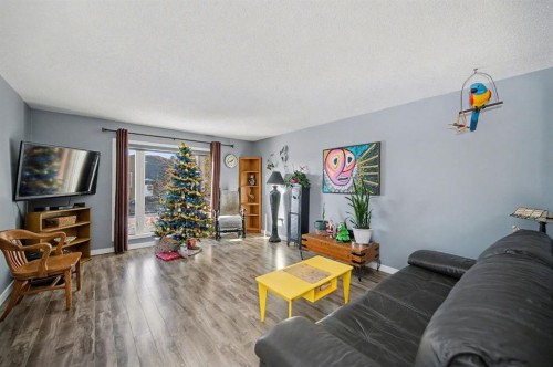 106 Eldorado Road Se, Airdrie, AB - Indoor Photo Showing Living Room