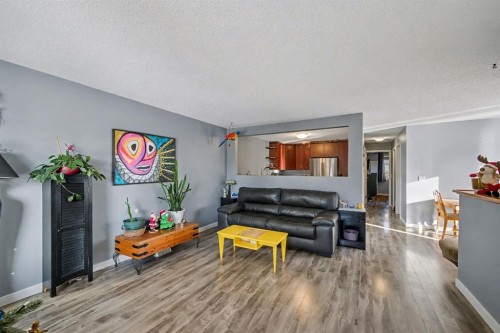 106 Eldorado Road Se, Airdrie, AB - Indoor Photo Showing Living Room