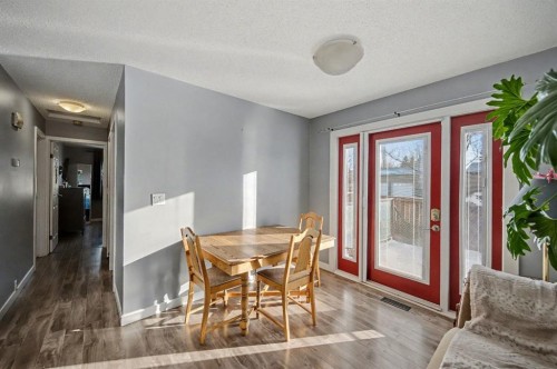 106 Eldorado Road Se, Airdrie, AB - Indoor Photo Showing Dining Room