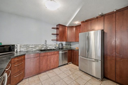 106 Eldorado Road Se, Airdrie, AB - Indoor Photo Showing Kitchen