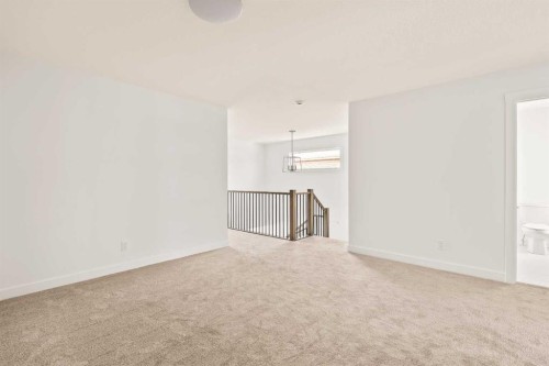 192 Creekstone Circle Sw, Calgary, AB - Indoor Photo Showing Other Room