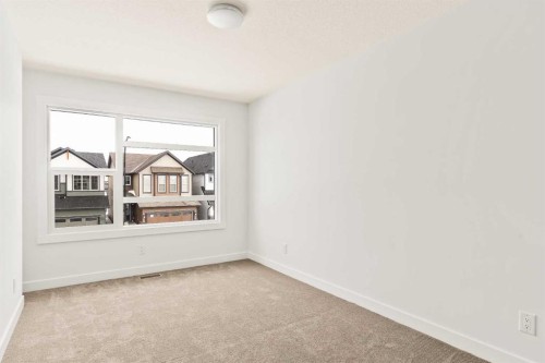 192 Creekstone Circle Sw, Calgary, AB - Indoor Photo Showing Other Room