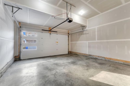 24 Corner Glen Green Ne, Calgary, AB - Indoor Photo Showing Garage